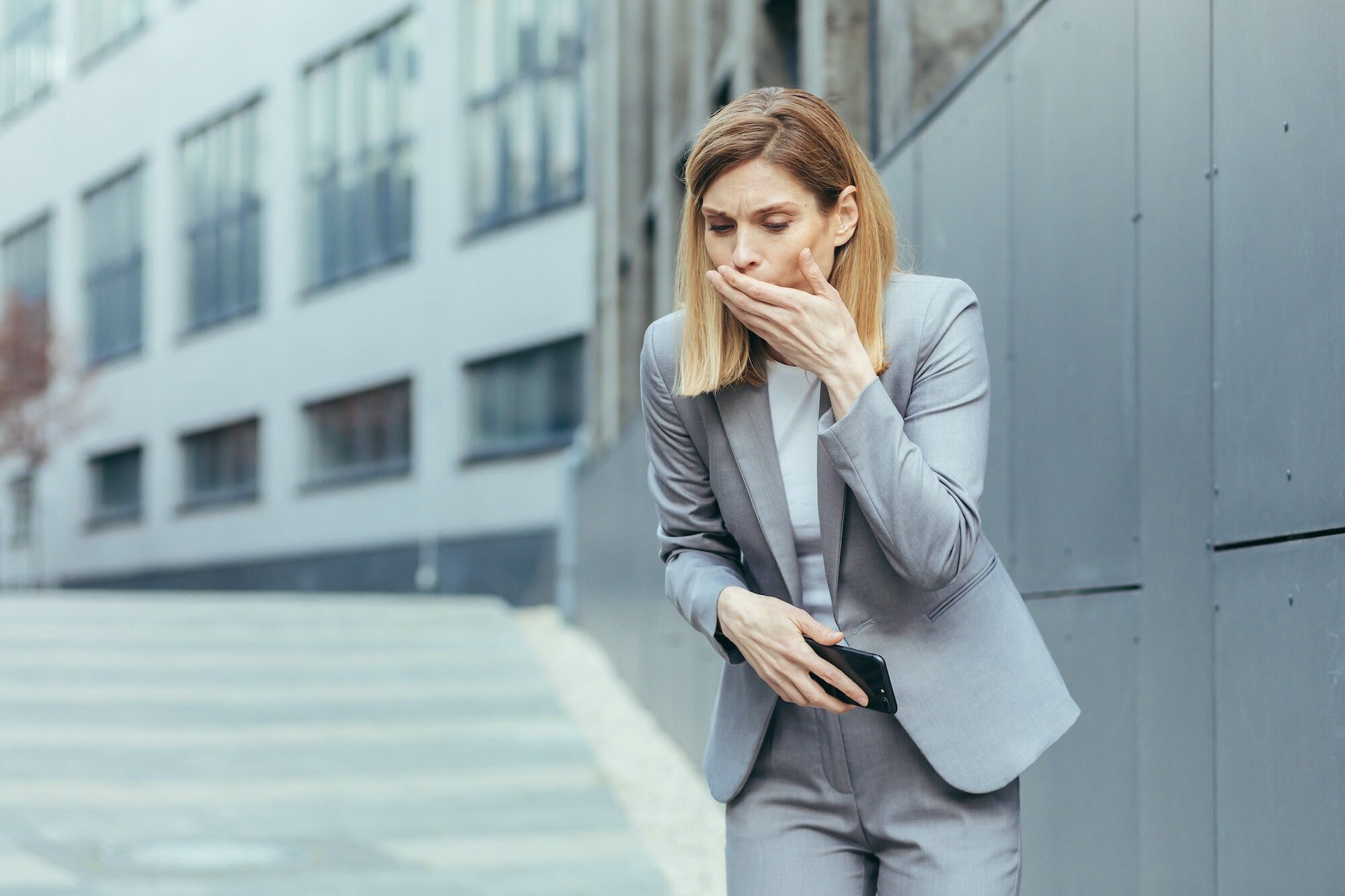 Woman near office nausea and vomiting reflex, sick businesswoman